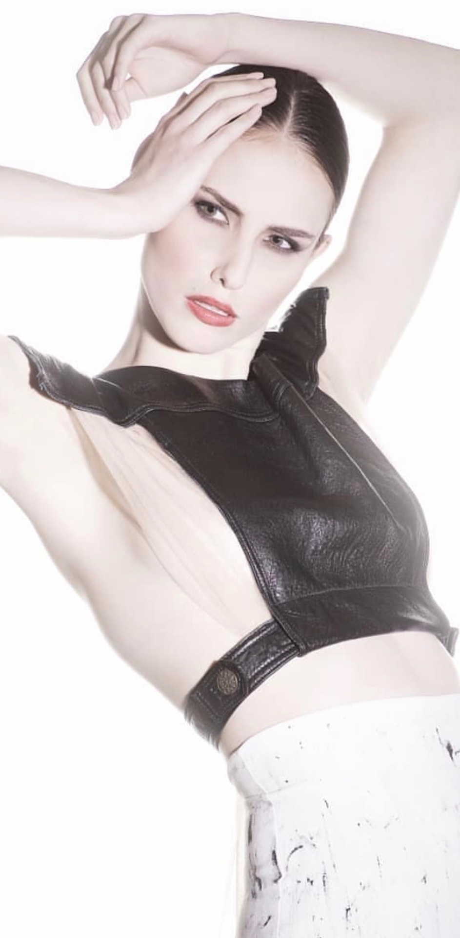 Editorial portrait wearing the sculptural black bodice