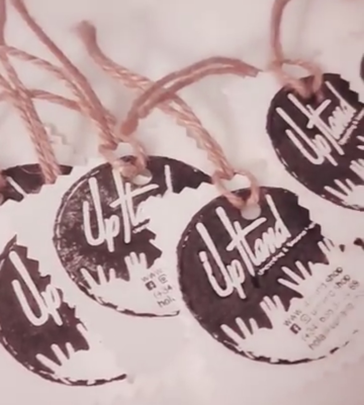 Hand-stamped UpHand labels with twine.