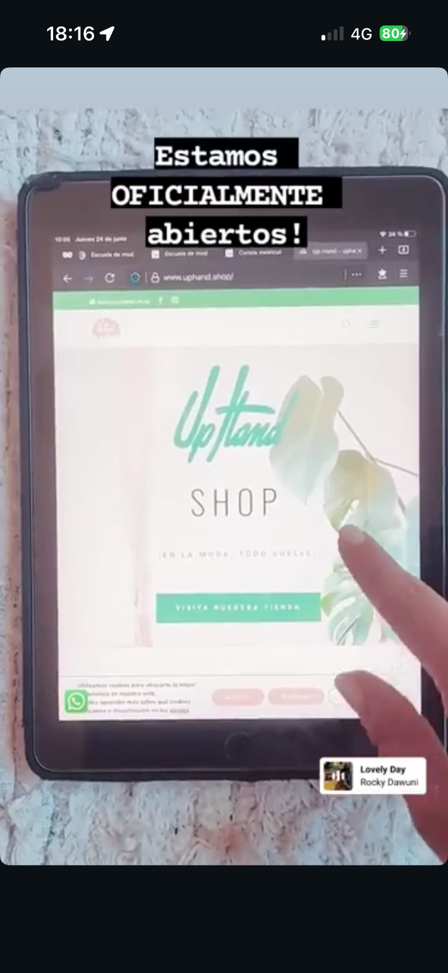 UpHand Shop launch announcement on a mobile screen.