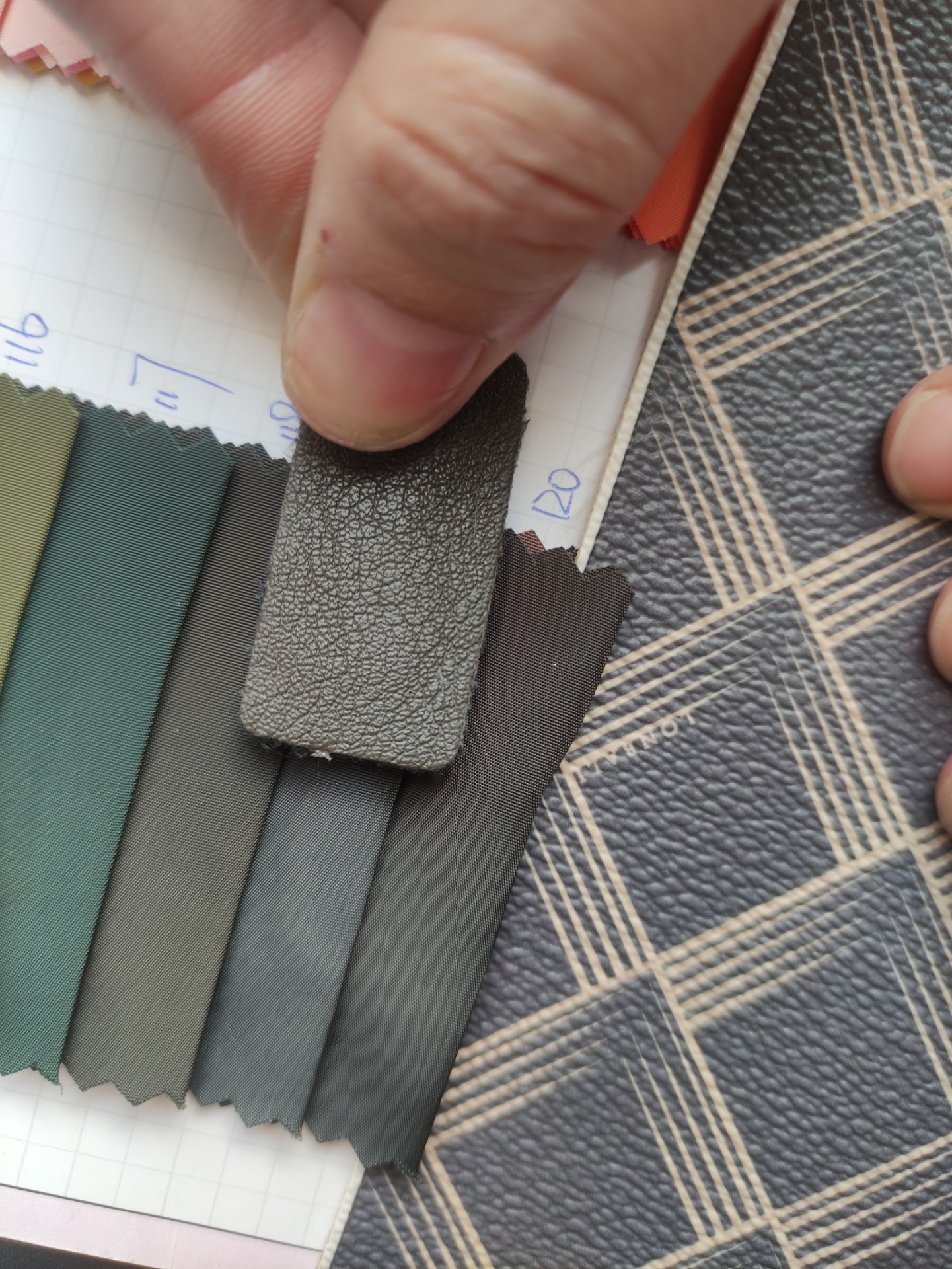 Leather and lining colour samples against a Lonbali printed material.